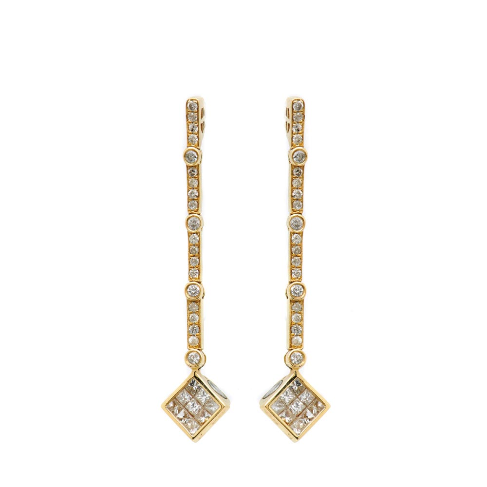 Pendientes largos en oro 14K. con diamantes tallas brillante y princesa.Transformables. Peso