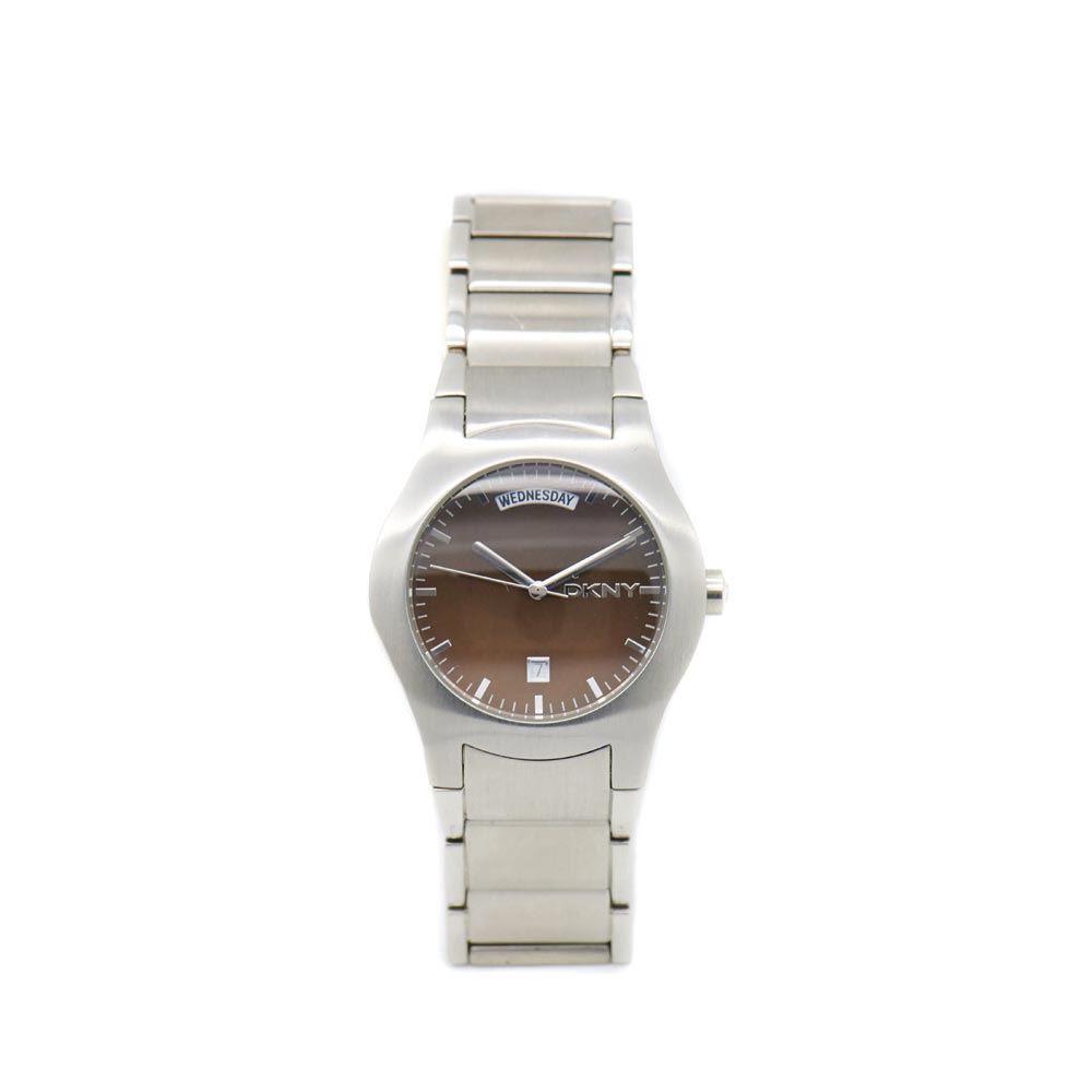 Reloj DKNY de pulsera para caballero. En acero. Esfera marrón con numeración a trazos aplicados y