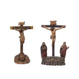 Escuela española, s.XIX. Crucifixión. Lote de dos esculturas en madera tallada, policromada y