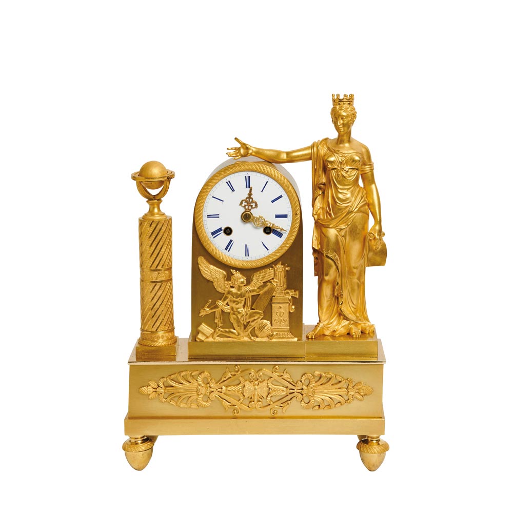 Reloj de sobremesa Imperio en bronce dorado, primer tercio del s.XIX. Caja flanqueada por figura