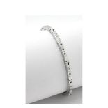 Pulsera en oro blanco con diamantes talla brillante engastados en chatón. Peso diamantes: 0,48 ct.