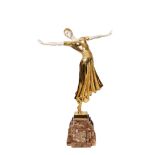 Escuela europea, s.XX. Bailarina. Escultura criselefantina estilo Art Deco en bronce dorado y marfil