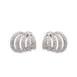 Pendientes calados en oro blanco con pavé de diamantes talla brillante. Peso diamantes: 3,15 ct.