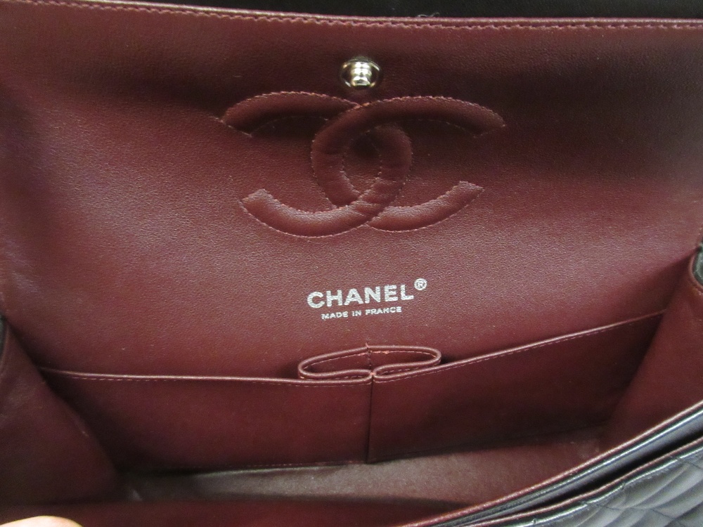 Ladies Chanel Uni black quilted handbag with original guarantee card, dust cover, - Image 5 of 7