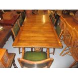 Mid 20th Century oak dining room suite comprising: draw-leaf refectory style dining table raised on