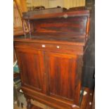 19th Century rosewood chiffonier with a shelf back above two panel doors on a plinth base