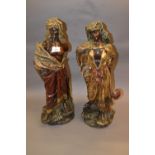 Pair of large 19th Century Austrian painted terracotta figures of a Moorish man and woman (some