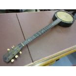 Early 20th Century banjo with mother of pearl inlaid neck (at fault)