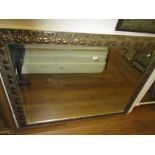 Large reproduction gilt moulded composition rectangular wall mirror