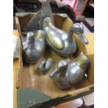 Four pewter duck form boxes together with an aluminium model of a yacht