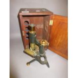 Early 20th Century gilt brass and black Japanned microscope by Reynolds and Branson,