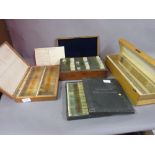 Large quantity of microscope slides housed in three boxes