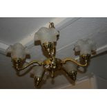 Reproduction brass five light electrolier with frosted glass shades together with a similar three