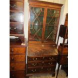 19th Century and later mahogany bureau bookcase having moulded key pattern cornice above two bar