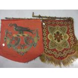 19th Century woolwork and beadwork screen with coat of arms and another woolwork face screen with