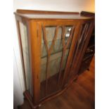 Mid 20th Century walnut semi bow fronted display cabinet