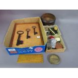 Framed group of three 19th Century iron door keys, boxwood rule, sewing tape, pin box,