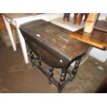 Small late 19th or early 20th Century oval gate leg table on baluster turned supports with