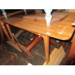 1960's Teak rectangular fixed dining table on slender tapering supports