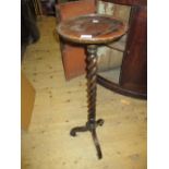 20th Century oak jardinière stand on single barley twist column with splay supports,