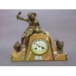 Art Deco yellow marble and gilt metal mounted two train mantel clock surmounted by a figure of a