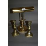 20th Century brass desk lamp and a pair of brass candlesticks