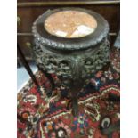 19th Century Chinese carved padouk vase stand with a rouge marble inset top,