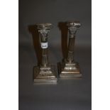 Pair of Sheffield silver Corinthian column candlesticks with matching sconces on square bases,