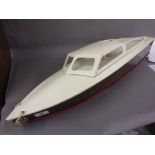Painted wooden model motor boat launch