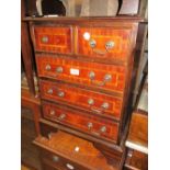 Reproduction mahogany bedside chest having two short drawers above three long drawers with brass