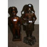 Fireside tool set in the form of a town crier and another in the form of a Dutch boy with coppered