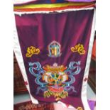 Large Asian wall hanging banner with embroidered decoration in silks of various symbols