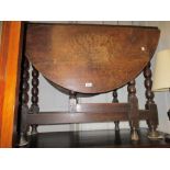 19th Century oak oval drop-leaf table on bobbin turned supports