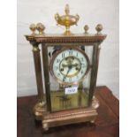 Late 19th or early 20th Century gilt brass four glass library clock with enamel dial,