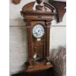 Oak cased Vienna wall clock,