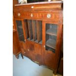 19th Century French kingwood side cabinet with a rouge marble inset top above alcove and doors