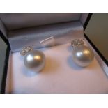 Pair of 18ct white gold South Sea pearl and diamond drop earrings,