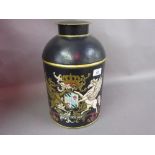 Reproduction toleware tea canister decorated with a coat of arms