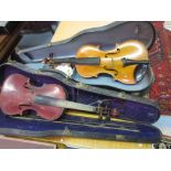 Two cased violins with bows (one at fault)