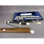 Nickel plated flute by Emerson in a fitted together with a Yamaha recorder