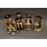 Staffordshire snuff taker Toby jug and three others similar