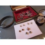 9ct Gold diamond and garnet set flower head ring, in original antique box,