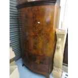 Early 20th Century figured walnut bow front wardrobe,