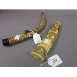 Oriental carved bone opium pipe together with an Indian resin figure of a deity