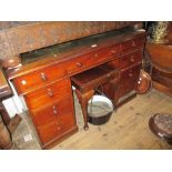 Victorian mahogany twin pedestal desk with a leather inset top above nine drawers on plinth bases