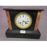 Small black slate and rouge marble two train mantel clock