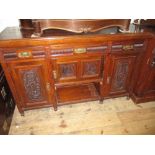 19th Century walnut sideboard having mirrored galleried back above three drawers and three panelled