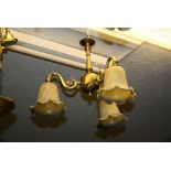 Pair of good quality reproduction brass three branch chandeliers with iridescent glass shades,