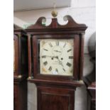 George III oak longcase clock with a square hood above rectangular panelled door and a shaped