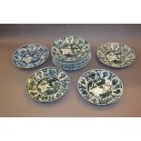 Set of twelve 20th Century Chinese plates decorated in blue and white with birds